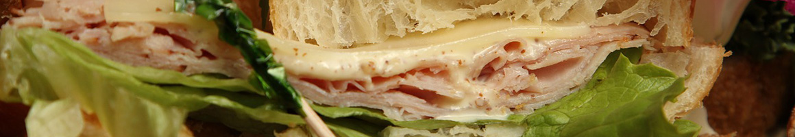 Eating American (New) Sandwich at Urbane Cafe restaurant in Oxnard, CA.